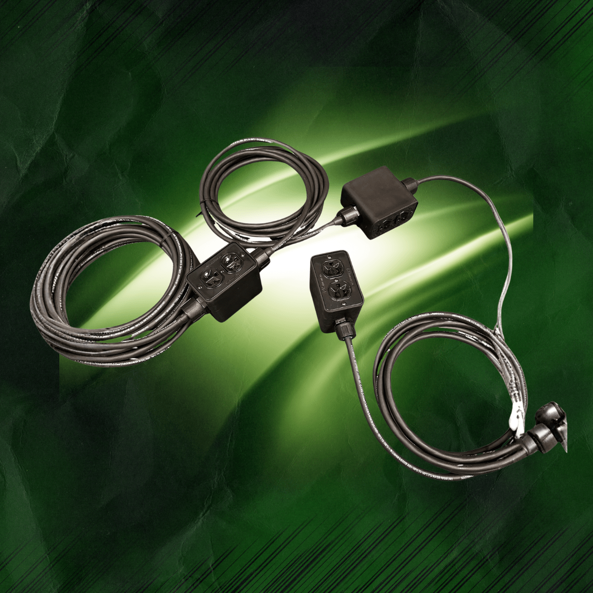 Custom power drop-One male Edison leads to three separate boxes to be dropped in different areas of a stage or room, to turn one male into 12 potential spaces